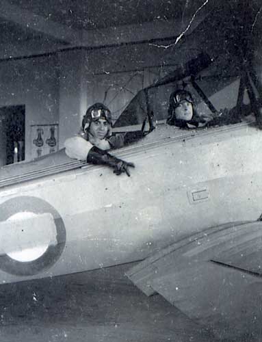 Abram Shreve Poses in Plane WWII