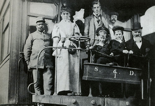 Porter with passengers on Canadian Pacific Transcontinental in the 1890s  Courtesy of Canadian National Railway