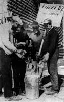 City Workers Pete Fields, Warren Allen, John Day and Leo Belanger, members of Local 82, are pictured at the Mercer Street garage during a strike in October of 1958  Clipping from the Windsor Star 01/10/1958 in the McCurdy Collection at the Archives of Ontario