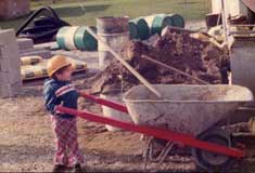 P10786 - Child with Wheelbarrow Circa 1970s, Courtesy of Rosati Family 