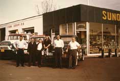 P11021 - Men outside Sunoco 1964. Courtesy of Flora Ghione