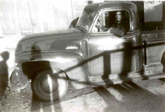 P11972 - Anthony Pupatello - Vince Pupatello in the first company truck, September 1954