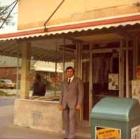 P12034 - John Lo Mascolo in front of his store, Johns Imports. Courtesy of Lo Mascolo family