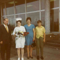 Giulio, Elena, Domenica (the daughter) and Michael Caldarelli (the son) in the graduation ceremony of their daughter as a registered nurse. Courtesy of Domenica Mandarino