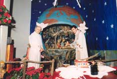 Nativity scene at St. Angela Merici Church with Fr. Lino Santi and Fr. Giovanni Bizzotto, 1985.  Courtesy of St. Angela Merici Church, P10545  